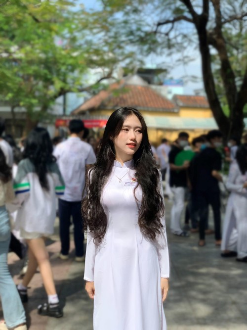 Sexy cute Ao Dai. Tight dress and nice body.